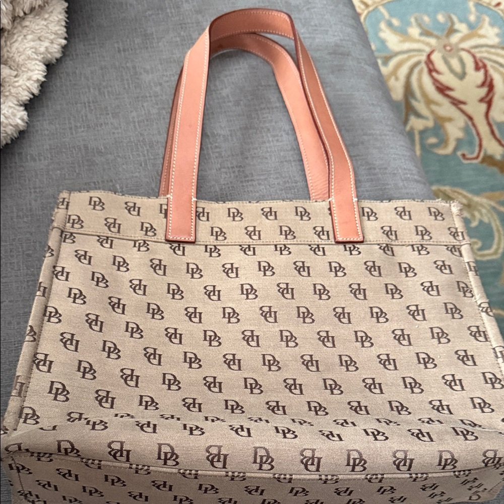Dooney and Bourke Canvas Logo Tote with Tan Leather Handles